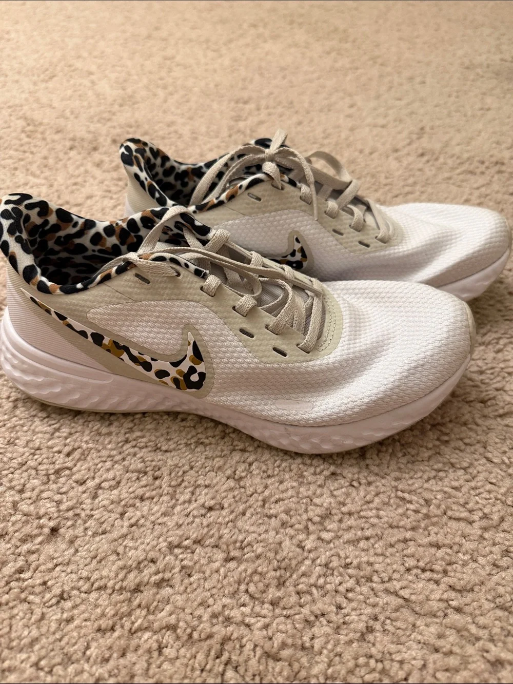 Nike Women's White Athletic Shoes with Leopard Accent